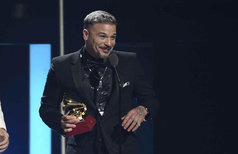 Pedro Capó ganó los Latin Grammy a la canción del año por "Calma" y Mejor Fusión/Interpretación Urbana por "Calma Remix" junto al reguetonero puertorriqueño Farruko. (AP / Chris Pizzello)