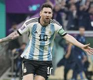 Lionel Messi celebra tras marcar el primer gol de Argentina en la victoria 2-0 ante México en el partido por el Grupo C del Mundial, el sábado 26 de noviembre.