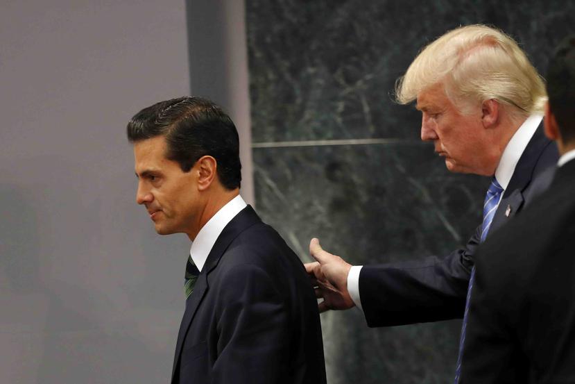 Peña Nieto defendió la decisión de invitar a los dos candidatos presidenciales de Estados Unidos. (Archivo / AP)