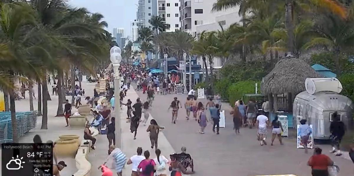 Turistas y bañistas salen corriendo por tiroteo en Hollywood Beach de Florida