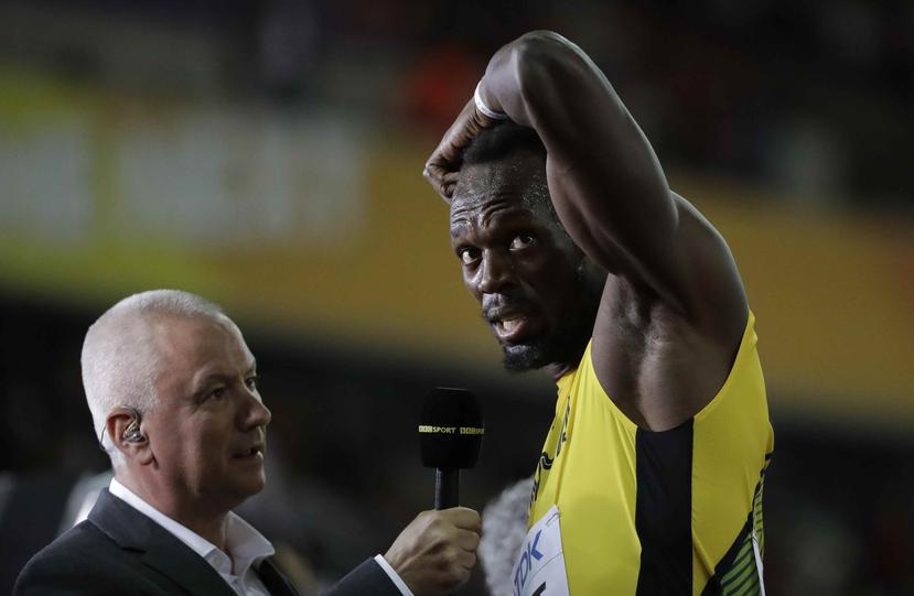 Los 60,000 espectadores rugieron cuando el locutor del estadio proclamó a Bolt como “la leyenda del atletismo”. (AP)
