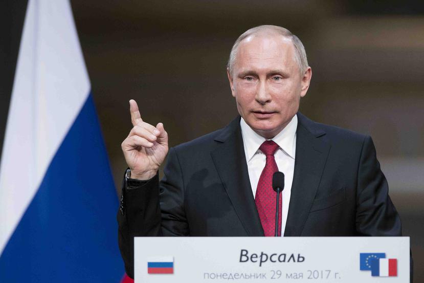 El gobernante ruso afirmó que coincidía con Trump en que cualquiera podría estar detrás de los hackeos contra los demócratas. (AP)