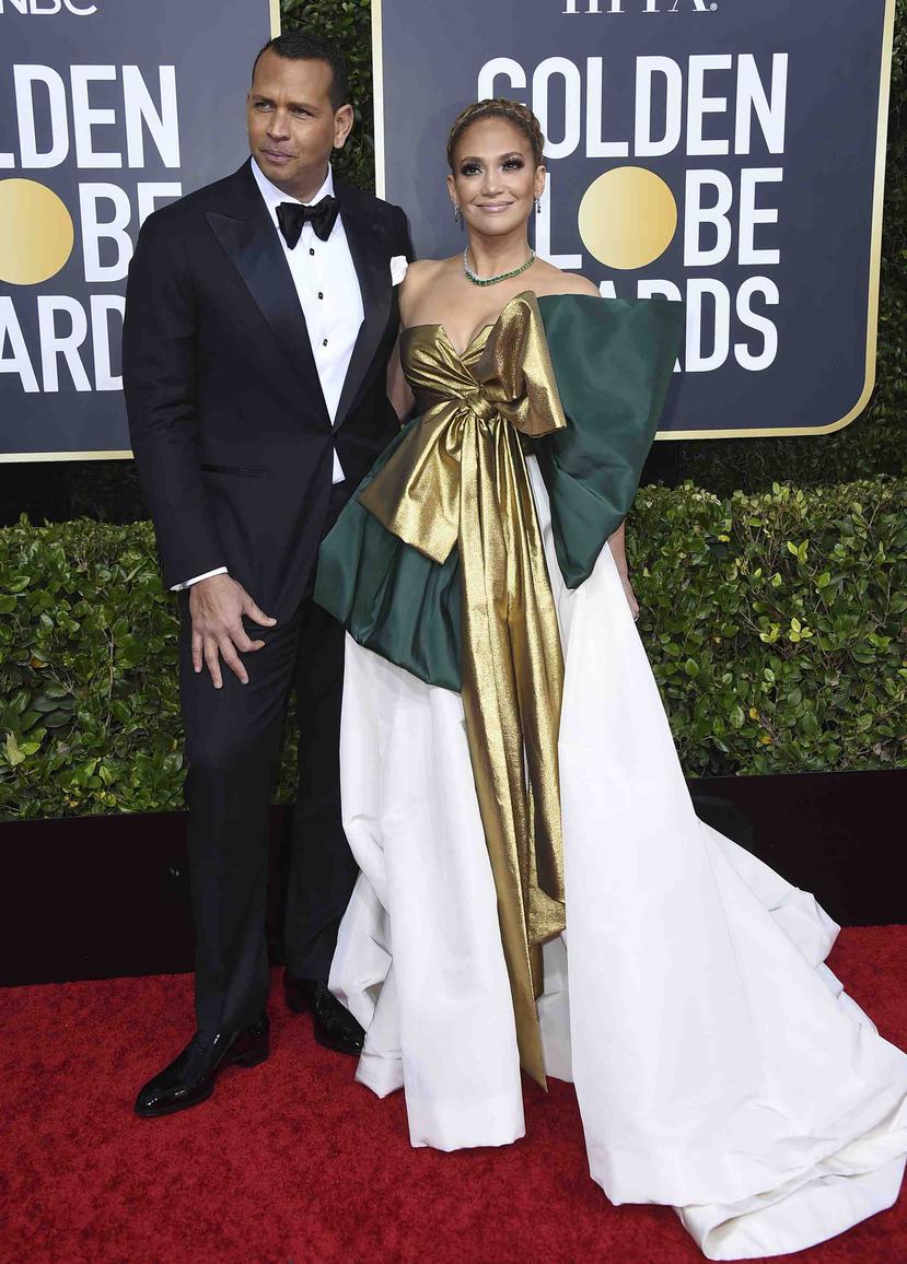 Alex Rodríguez y Jennifer López arribaron juntos a la entrega de los premios Golden Globe a los que la actriz y cantante estaba nominada por su actuación en la película "Hustlers".  (AP)