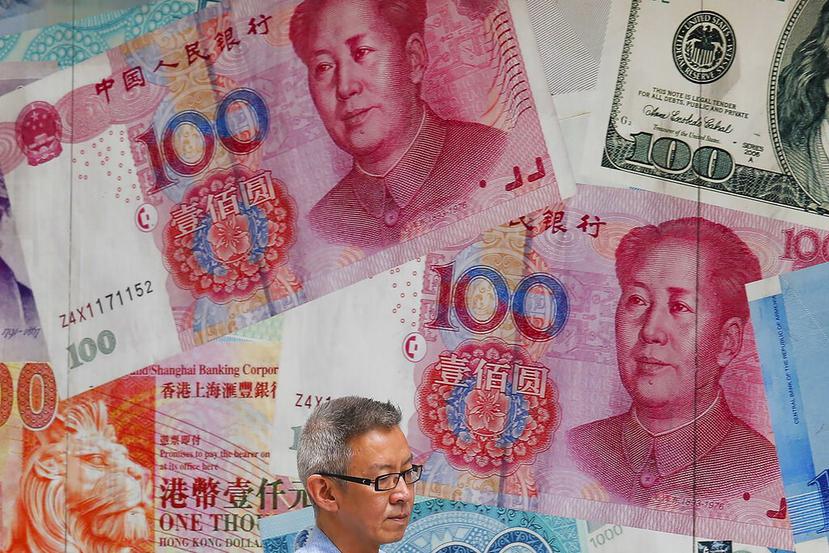 La súbita devaluación del yuan estremeció a los mercados financieros. (AP)