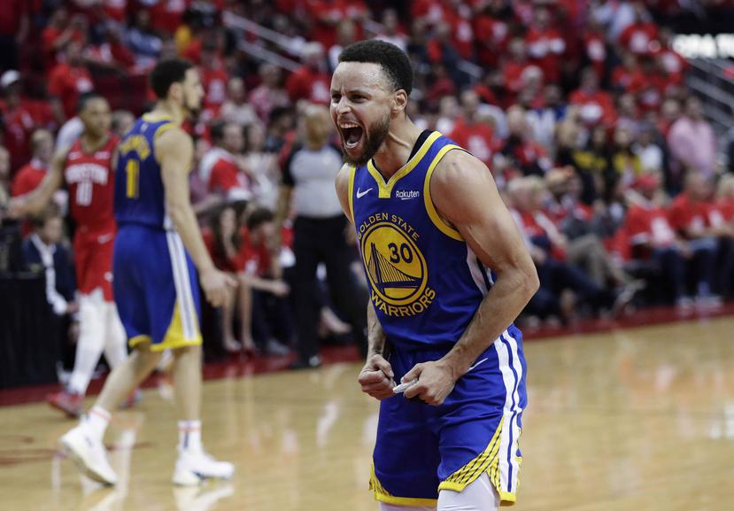 Curry celebra la victoria.  (AP/Eric Gay)