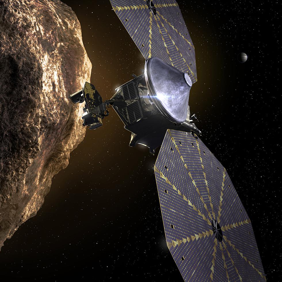 Esta imagen suministrada por el Southwest Research Institute muestra la sonda espacial Lucy acercándose a un asteroide.