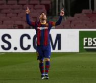 Lionel Messi celebra tras anotar el primer gol del Barcelona en la victoria 2-1 ante el Athletic Bilbao por la Liga española en Barcelona, el domingo 31 de enero de 2021.