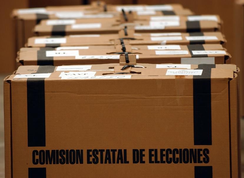 Maletas de la Comisión Estatal de Elecciones donde se guardan las papeletas. (GFR Media)