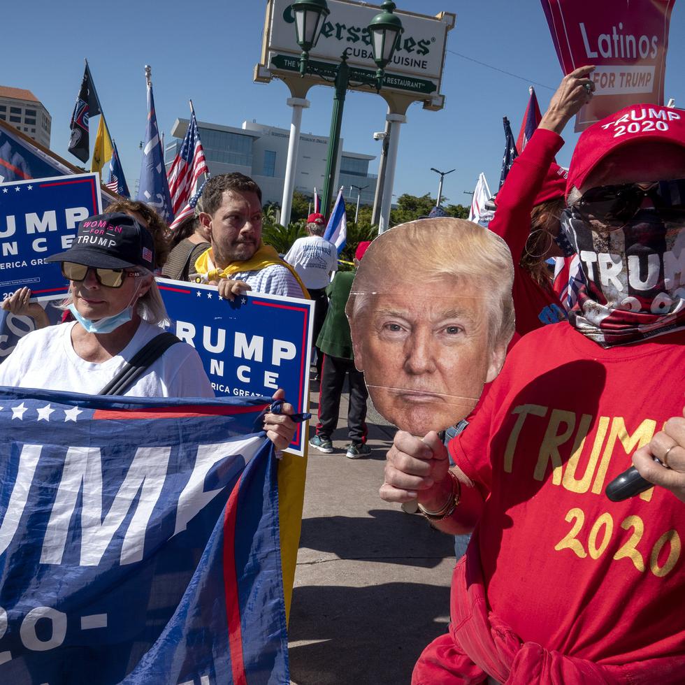 Miami (United States), 06/01/2021.- Supporters of US President Donald J. Trump attend a rally named 'Trump Victory Caravan II' in front of the Versailles restaurant in Miami, Florida, USA, 06 January 2021. The rally is organized by the group 'Cubans 4 Trump' to show their support for President Trump as US lawmakers are set to confirm the Electoral College vote won by Joe Biden. (Estados Unidos) EFE/EPA/CRISTOBAL HERRERA-ULASHKEVICH