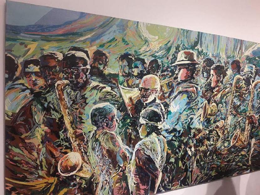 “Comparsa caribeña”, óleo sobre lienzo, 96”x48”, de Wichie Torres que se exhibe en la galería universitaria. (Suministrada)