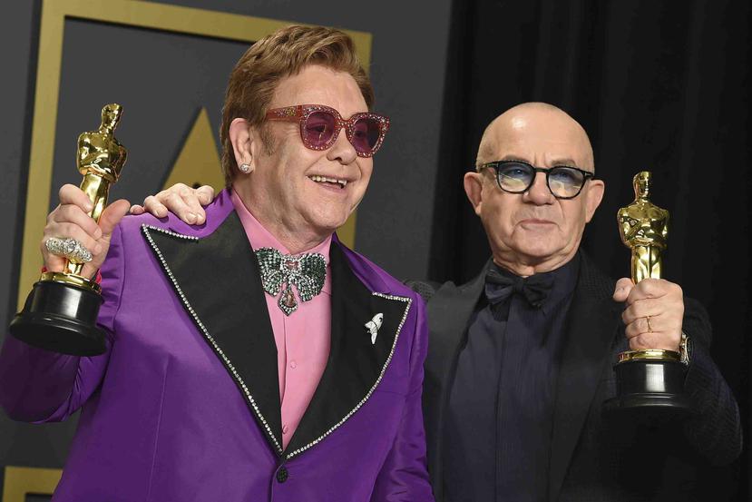 Elton John junto a Bernie Taupin. (AP/Jordan Strauss)