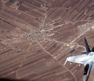 En esta imagen, tomada de un video distribuido por la Fuerza Aérea de EEUU, un SU-35 ruso vuela cerca de un dron MQ-9 Reaper estadounidense el 5 de julio de 2023, sobre Siria.
