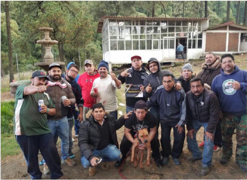 This photo occupied by the Federal Prosecutor's Office shows the defendant with some of his followers on a trip he made to Mexico.