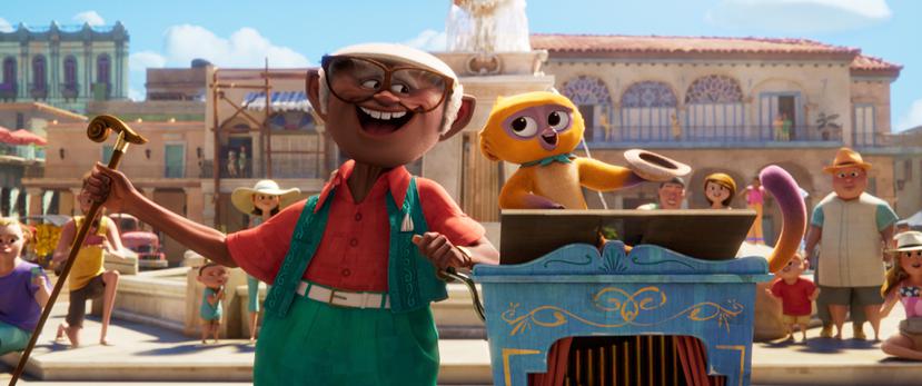 Fotograma cedido por Netflix donde aparecen los personajes "Andrés" (con voz de Juan de Marcos González) y "Vivo" (con voz de Lin-Manuel Miranda), durante una escena del musical animado "Vivo".