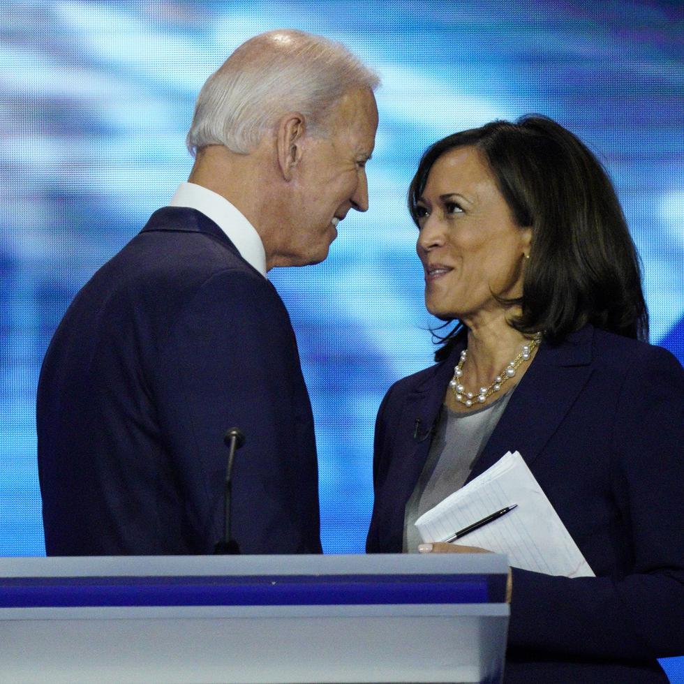 FILE - In this Sept. 12, 2019, file photo, Democratic presidential candidate former Vice President Joe Biden, left, and then-candidate Sen. Kamala Harris, D-Calif. shake hands after a Democratic presidential primary debate hosted by ABC at Texas Southern University in Houston. Biden has chosen  Harris as his running mate. (AP Photo/David J. Phillip, File)