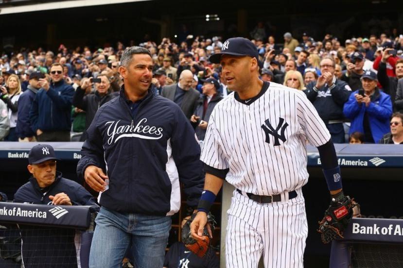 Jorge Posada, a la izquierda, y Derek Jeter jugaron juntos un total de 16 temporadas con los Yankees. (AFP)