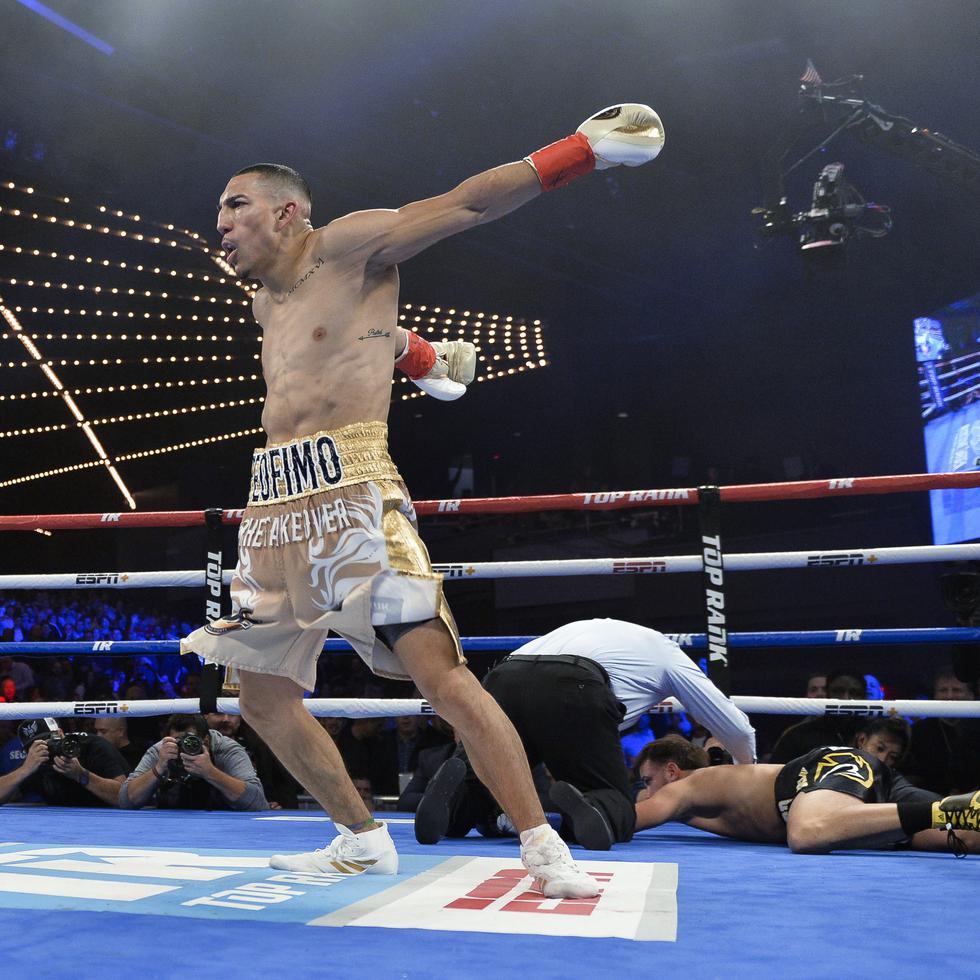 Teofimo Lopez celebrates after knocking out Mason Menard in the first round of lightweight boxing match at Madison Square Garden, Saturday, Dec. 8, 2018, in New York. (AP Photo/Howard Simmons)