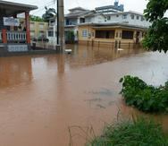 Las lluvias de julio que dejó la tormenta Isaías inundaron el sector Ensanche Martínez de Mayagüez.