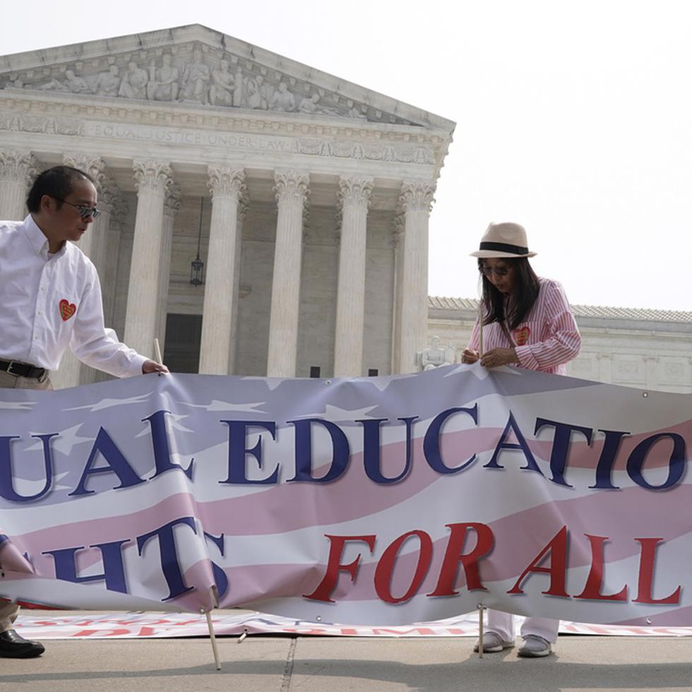 People protest outside of the Supreme Court in Washington, Thursday, June 29, 2023. The Supreme Court on Thursday struck down affirmative action in college admissions, declaring race cannot be a factor and forcing institutions of higher education to look for new ways to achieve diverse student bodies. (AP Photo/Mariam Zuhaib)