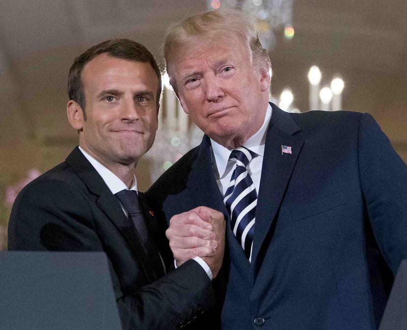 El presidente de Francia, Emmanuel Macron, junto a Donald Trump. (AP)