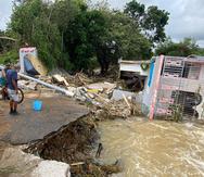 En la foto, la comunidad Guamaní, donde cinco casas y un carro fueron arrastradas por el río.