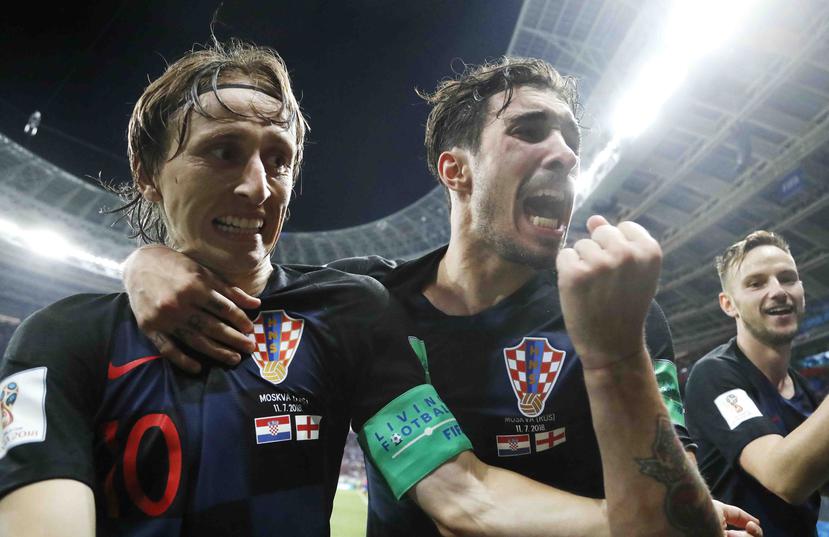 Luka Modric (izquierda) e Ivan Rakitic (derecha) lideran la escuadra de Croacia. (AP)