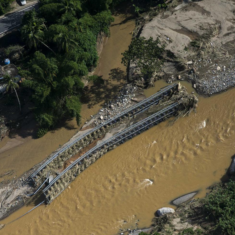 Este puente temporero, en el sector Salto Arriba de Utuado, fue arrastrado por las aguas del Río Grande de Arecibo, en medio de la emergencia que supuso el huracán Fiona.