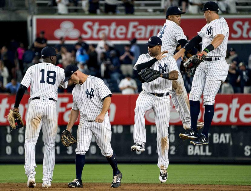 Los Yankees celebran su victoria sobre Boston. (AP)