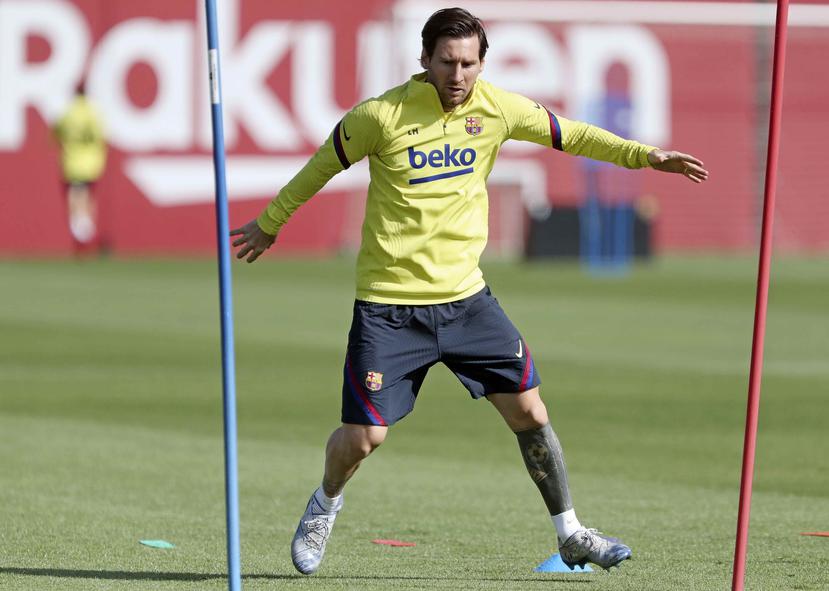 Los equipos de la liga reanudaron sus entrenamientos en pasados días. En la foto, Lionel Messi, del Barcelona. (AP)