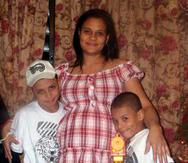 Lorenis Mejías, con ocho meses de embarazo, y sus hijos Nestor y Geremy fueron asesinados en la madrugada del 19 de marzo de 2011 en su apartamento en el residencial San Juan Park de Santurce.