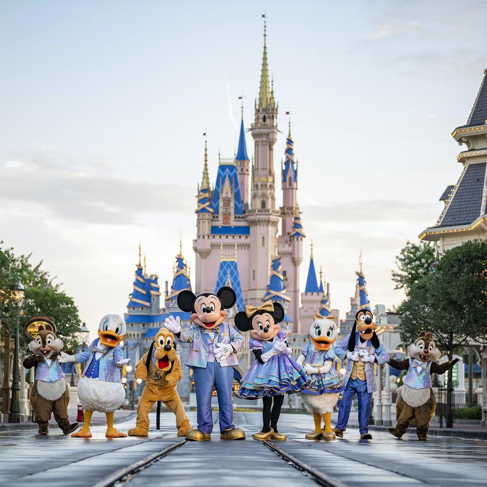 Beginning Oct. 1, 2021, Mickey Mouse and Minnie Mouse will host “The World’s Most Magical Celebration” honoring the 50th anniversary of Walt Disney World Resort in Lake Buena Vista, Fla. Mickey and Minnie will be joined by their best pals Donald Duck, Daisy Duck, Goofy, Pluto and Chip ‘n’ Dale all dressed in sparkling new looks, custom-made for the 18-month event, highlighted by embroidered impressions of Cinderella Castle on multi-toned, EARidescent fabric punctuated with pops of gold. (Matt Stroshane, photographer)  