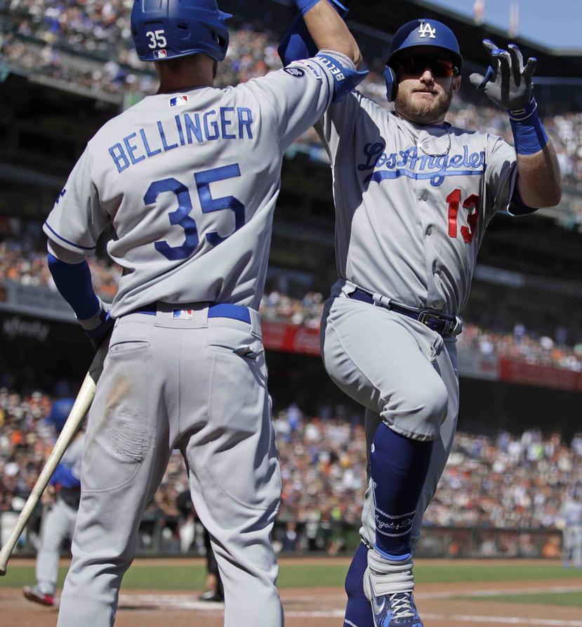Cody Bellinger y Max Muncy lideran la potente ofensiva de los Dodgers. (AP)