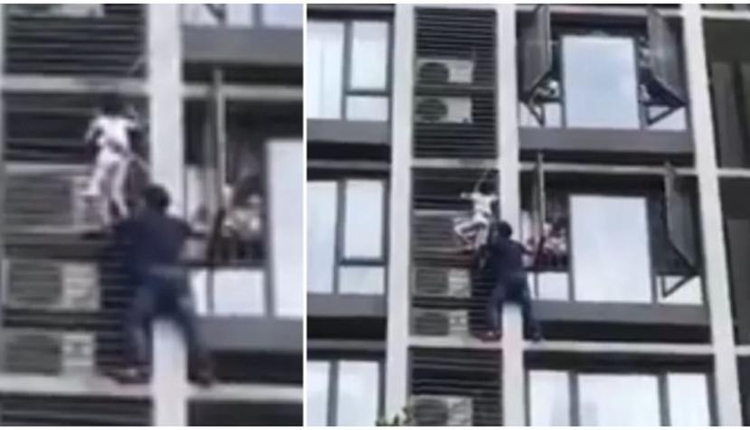 El heroico rescate de un padre que trepó un edificio para salvar a su hijo. (Captura / YouTube)
