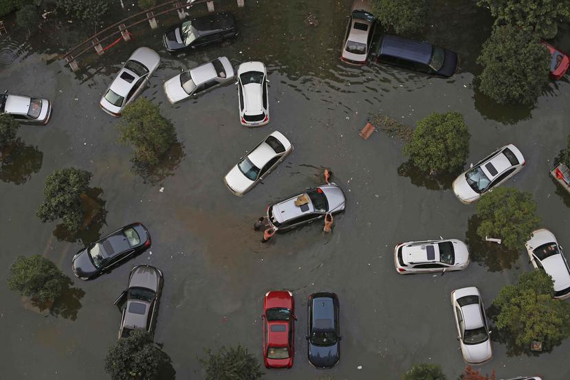 En la aldea de Daxian, sobre 20 personas han muerto por las inundaciones. (EFE)