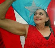 María Luisa Butter durante una actividad de la conmemoración de la bandera puertorriqueña, en el 2001.  (Archivo)