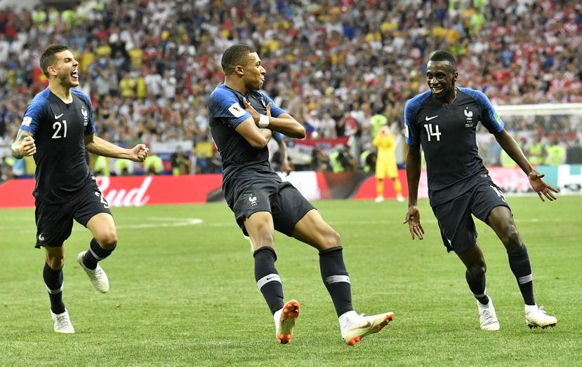 El símbolo de Nike sobresale sobre el número de los jugadores del equipo de Francia en la Copa Mundial. (AP)