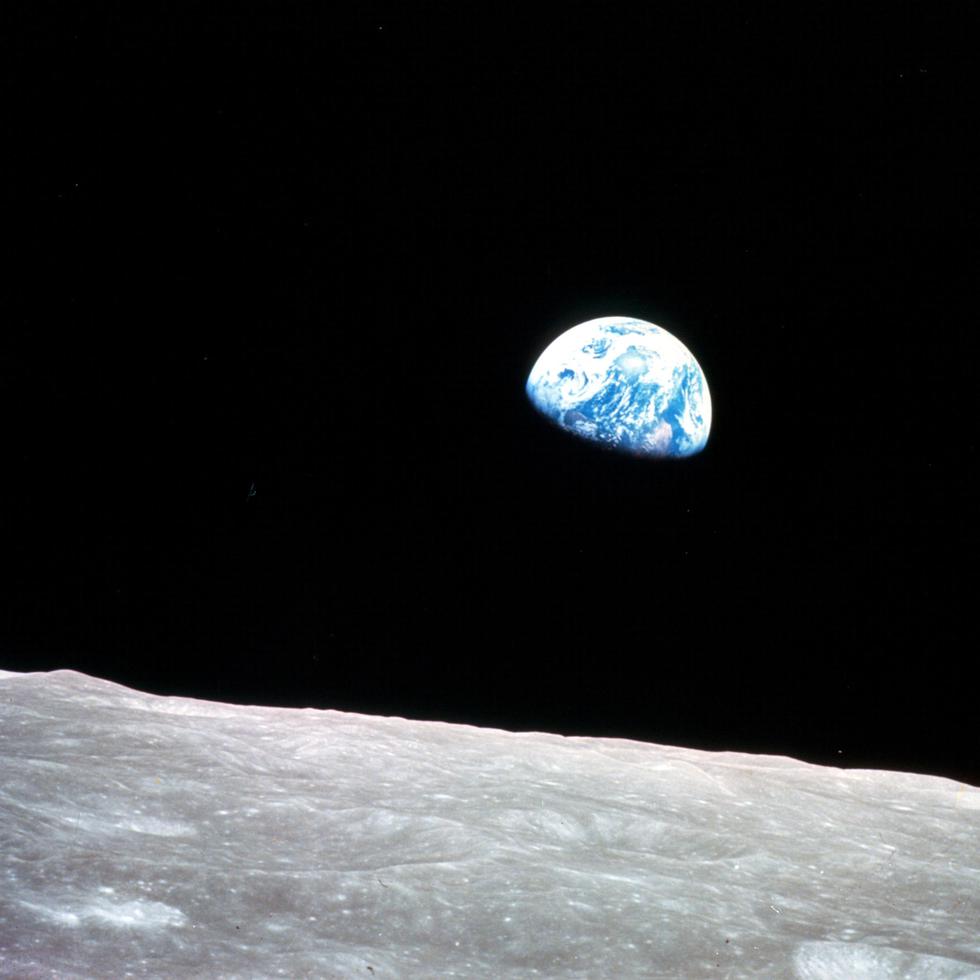 This NASA image obtained on April 22, 2009, Earth Day, shows the Earthrise over the moon made on Christmas Eve, December 24, 1968 from Apollo 8, the first manned mission to the moon, as it entered lunar orbit. That evening, the astronauts--Commander Frank Borman, Command Module Pilot Jim Lovell, and Lunar Module Pilot William Anders--held a live broadcast from lunar orbit, in which they showed pictures of the Earth and moon as seen from their spacecraft. Said Lovell, "The vast loneliness is awe-inspiring and it makes you realize just what you have back there on Earth." They ended the broadcast from lunar orbit, in which they showed pictures of the Earth and moon as seen from their spacecraft. Said Lovell, "The vast loneliness is awe-inspiring and it makes you realize just what you have back there on Earth." They ended the broadcast with the crew taking turns reading from the book of Genesis.    AFP PHOTO / NASA    == RESTRICTED TO EDITORIAL USE / NO SALES / GETTY OUT ==

