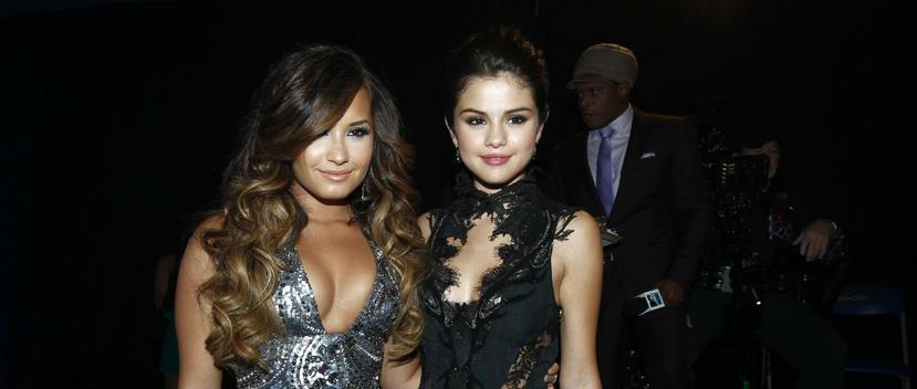 Demi Lovato y Selena Gómez han estado unidas por una fuerte amistad desde la niñez, cuando ambas participaron en programas como Barney. (Foto: AP)