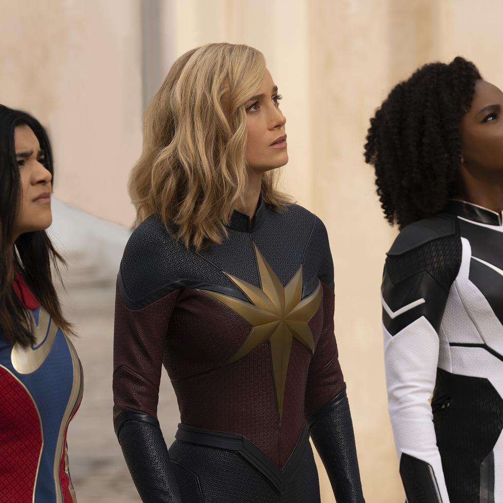 This image released by Disney shows, from left, Iman Vellani as Ms. Marvel, Brie Larson as Captain Marvel, and Teyonah Parris as Captain Monica Rambeau in a scene from "The Marvels." (Laura Radford/Disney-Marvel Studios via AP)