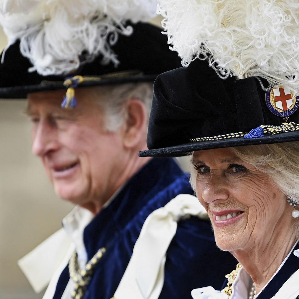 FILE - Britain's Prince Charles and Camilla, Duchess of Cornwall arrive for the Order of the Garter service at Windsor Castle, in Windsor, England, Monday, June 13, 2022. (Toby Melville/Pool Photo via AP, File)