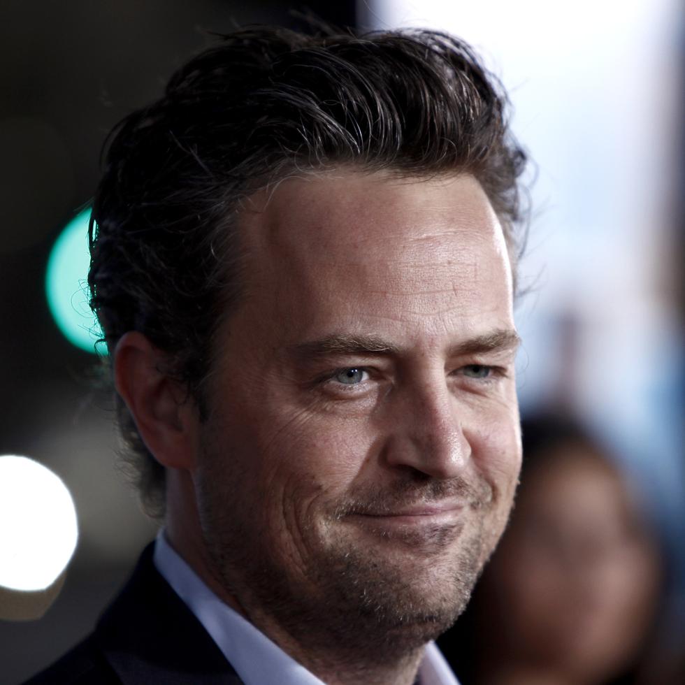 FILE - Matthew Perry arrives at the premiere of "The Invention of Lying" in Los Angeles on Monday, Sept. 21, 2009. Perry, who starred Chandler Bing in the hit series “Friends,” has died. He was 54. The Emmy-nominated actor was found dead of an apparent drowning at his Los Angeles home on Saturday, according to the Los Angeles Times and celebrity website TMZ, which was the first to report the news. Both outlets cited unnamed sources confirming Perry’s death. His publicists and other representatives did not immediately return messages seeking comment. (AP Photo/Matt Sayles, File)