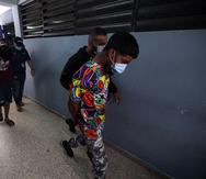 Dos de los arrestados en el operativo en un operativo contra la organización Rompe ONU en Trujillo Alto.