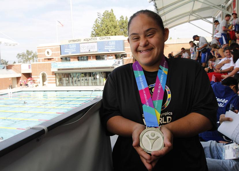 Eneida se encontraba en las facilidades de las piscinas para apoyar a su compañera de equipo, a Cristina de la Vega, quien participaría de la preliminar de 50 metros libre.