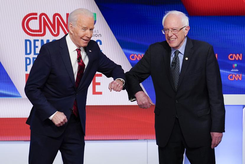 Joe Biden y Bernie Sanders. (AP)