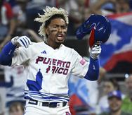 Francisco Lindor reacciona eufórico luego de pegar un hit en la primera entrada del partido entre Puerto Rico y Nicaragua en el Clásico Mundial de Béisbol.