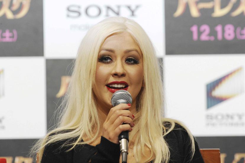 Christina Aguilera se convirtió en cómplice de un romántico momento en medio de su primer show de su "Liberation Tour". (EFE)