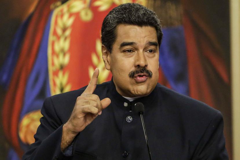 En los días previos a la Navidad, la nación petrolera ha vivido numerosas protestas espontáneas al no llegar a la gente la comida subsidiada y otras ayudas sociales prometidas por el presidente Nicolás Maduro. (EFE)