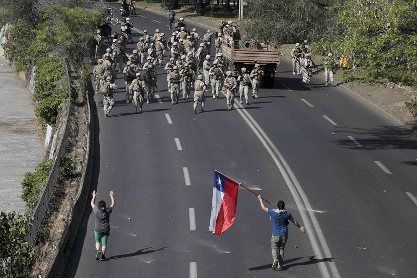Las calles de algunos puntos del país, que fueron escenario este sábado de violentos enfrentamientos con el Ejército y las fuerzas del orden. (AP/Esteban Felix)