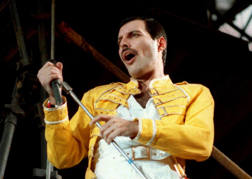 FILE - In this July 20, 1986 file photo, Queen lead singer Freddie Mercury performs, in Germany. Queen guitarist Brian May says an asteroid in Jupiter's orbit has been named after the band's late frontman Freddie Mercury on what would have been his 70th birthday, it was reported on Monday, Sept. 5, 2016. May says the International Astronomical Union's Minor Planet Centre has designated an asteroid discovered in 1991, the year of Mercury's death, as "Asteroid 17473 Freddiemercury." (AP Photo/Marco Arndt, File)