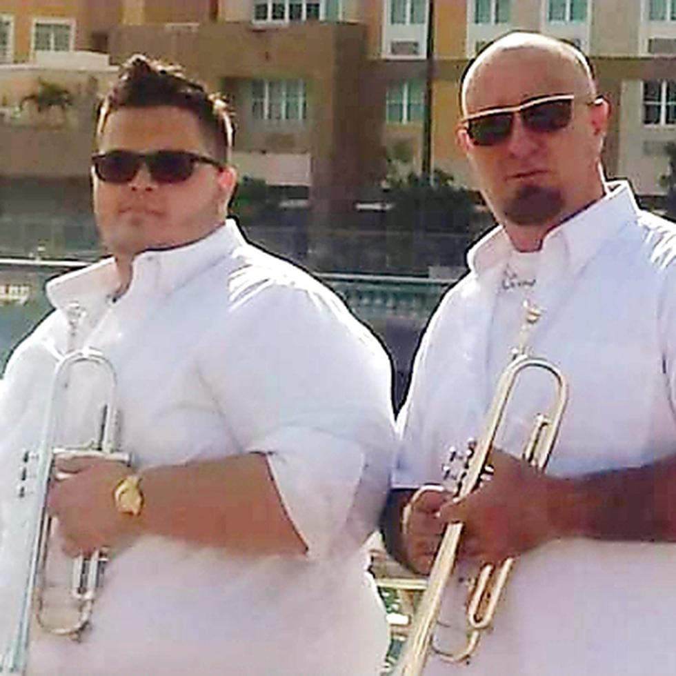 Ángel y Richie Segarra, hijo y padre respectivamente, son trompetistas en la orquesta La Puertorriqueña de Don Perignon.
